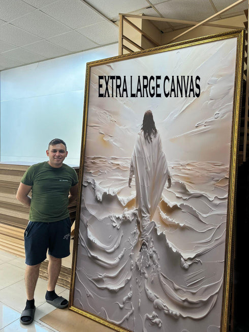 A man stands next to a large canvas painting depicting a figure in a flowing white robe walking on water.